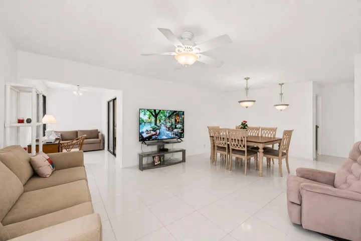 Virtually Enhanced Photo: This image has been digitally enhanced to showcase the home's potential with neutral paint colors and simplified décor. The home's layout and dimensions remain unchanged.