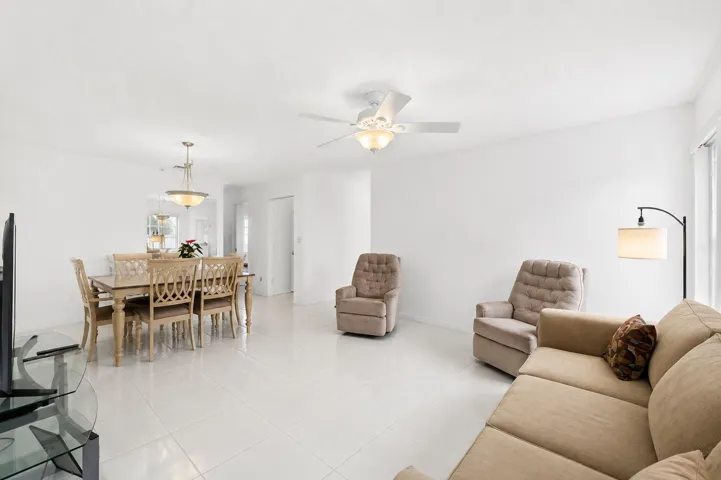 Virtually Enhanced Photo: This image has been digitally enhanced to showcase the home's potential with neutral paint colors and simplified décor. The home's layout and dimensions remain unchanged.