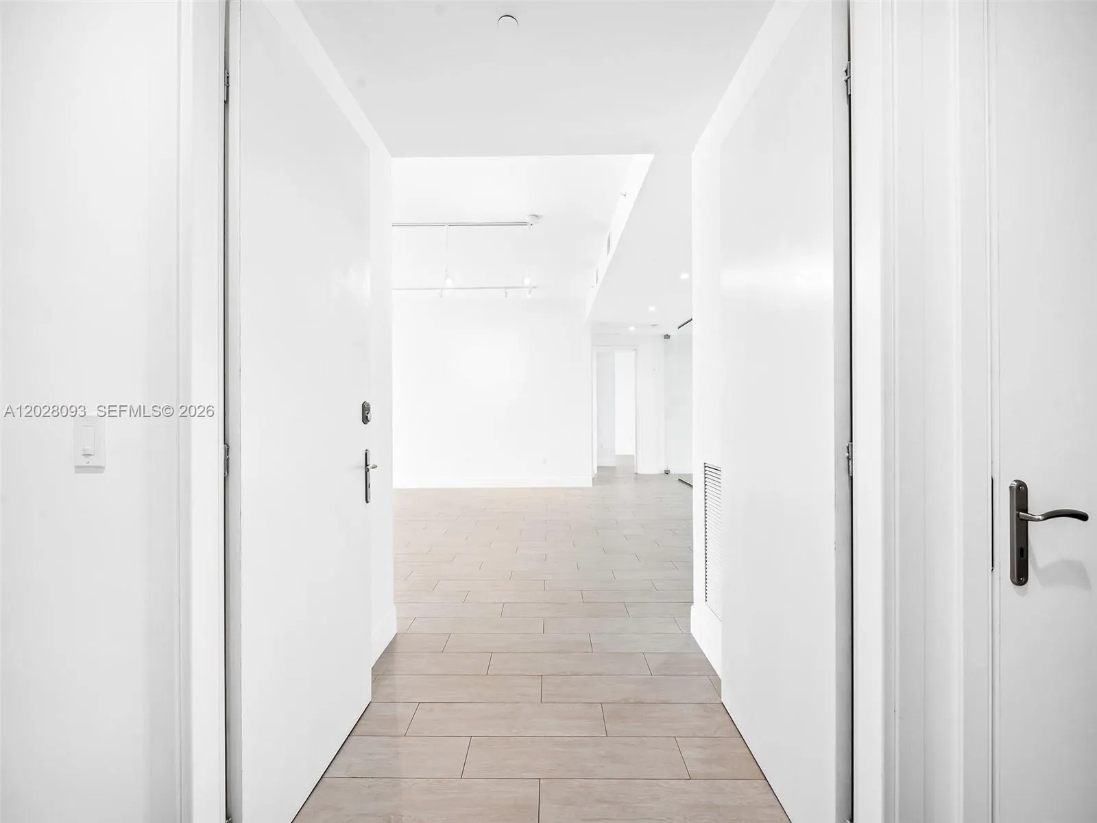 Step off elevator into your private foyer.