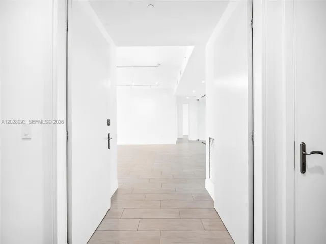 Step off elevator into your private foyer.