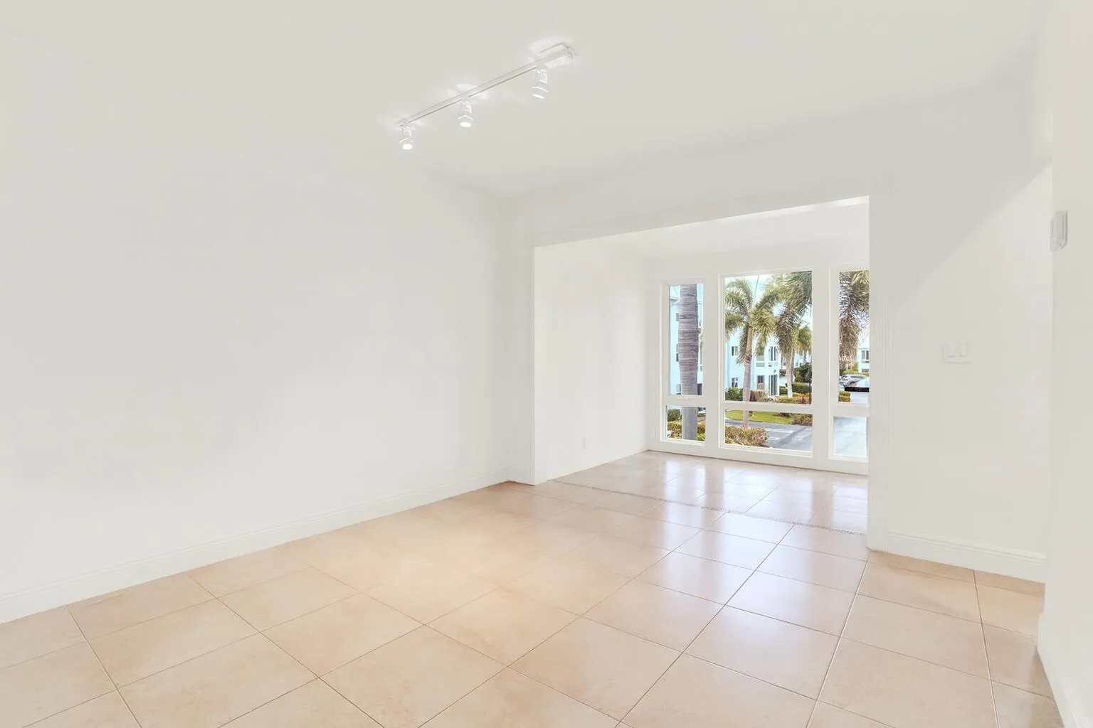 living room facing sunroom