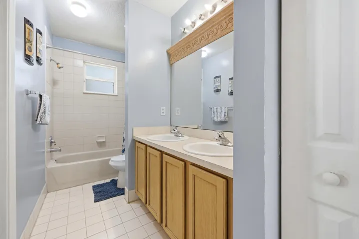 Second bathroom with dual sinks