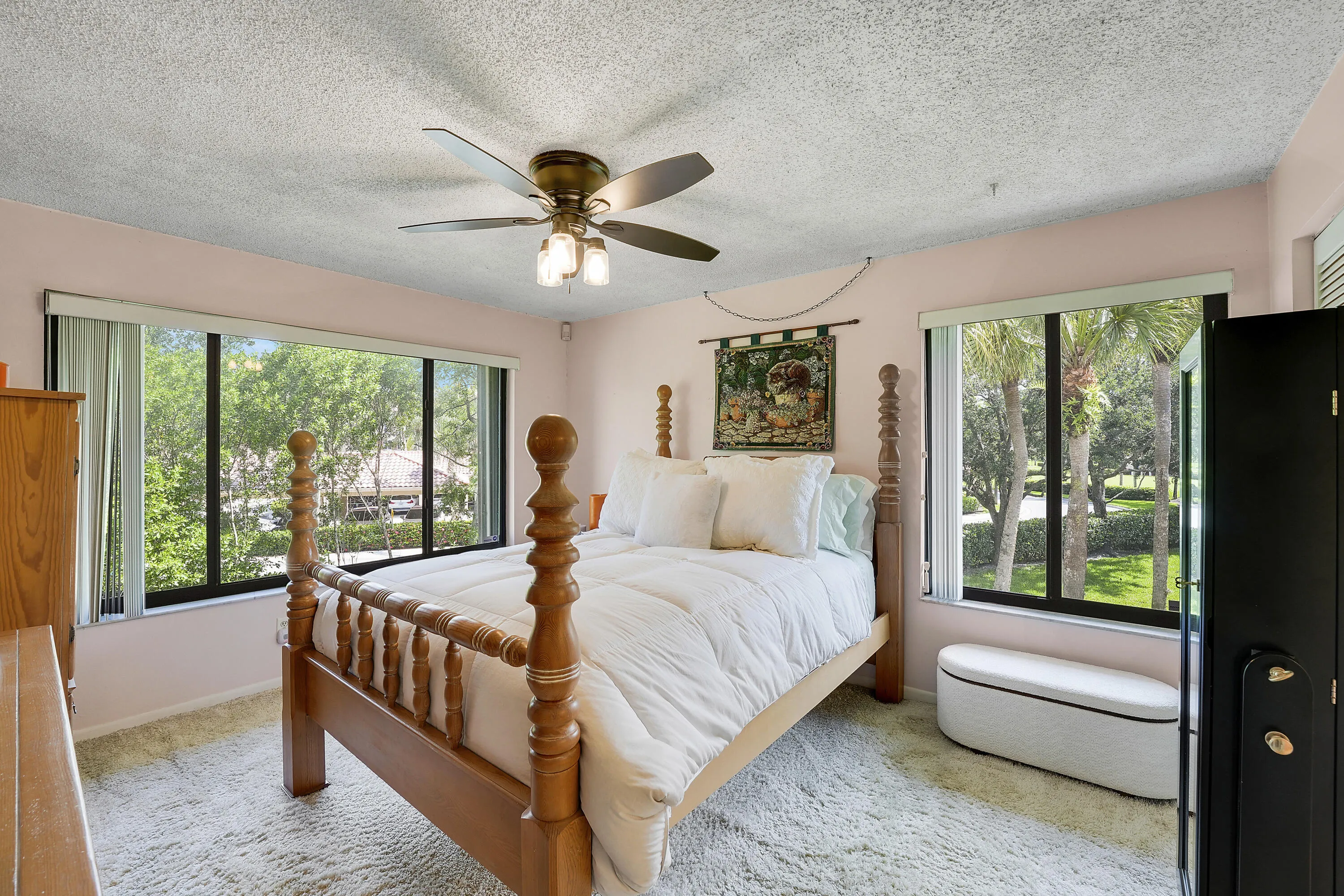 Primary bedroom filled with natural light