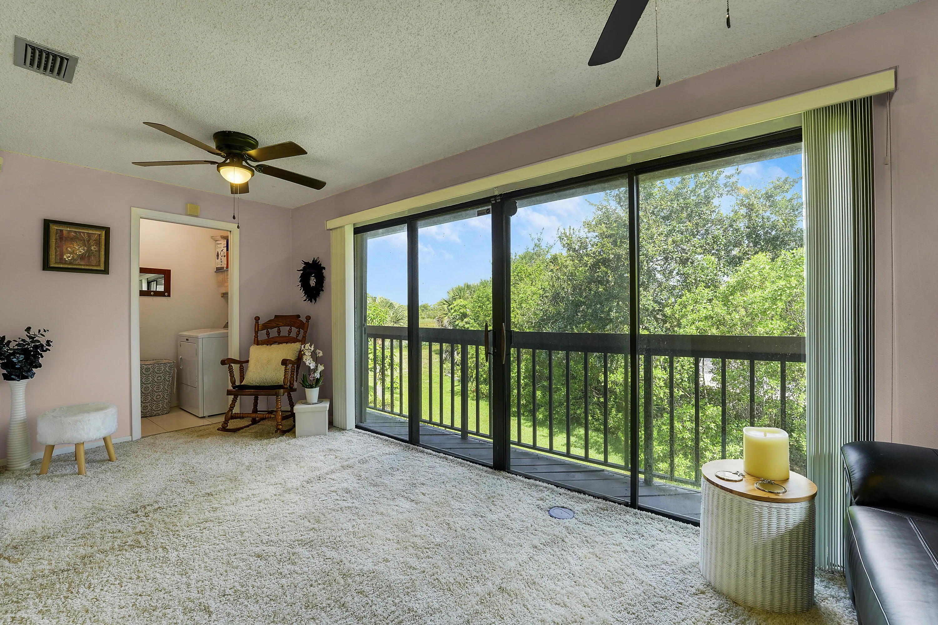 Florida room overlooking the preserve, with sliding doors & screened in.