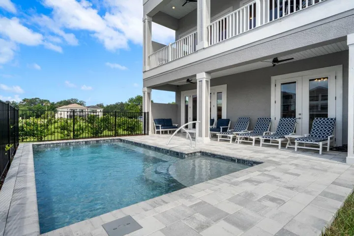 Resort-style outdoor living invites you to relax, unwind, and enjoy endless days by the pool in your own private coastal retreat.