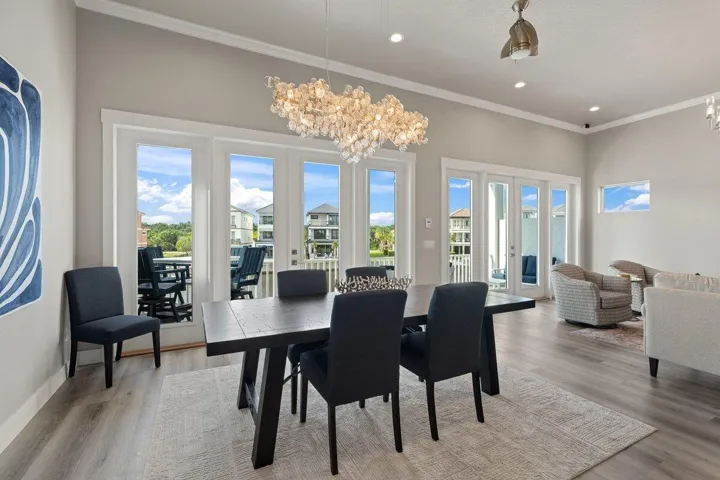 Imagine evenings filled with laughter and meaningful conversation as this beautiful dining space brings everyone together in a setting that feels both sophisticated and warmly inviting.
