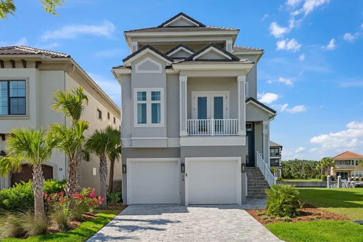Elevated coastal living meets timeless sophistication in this beautifully crafted waterfront home!