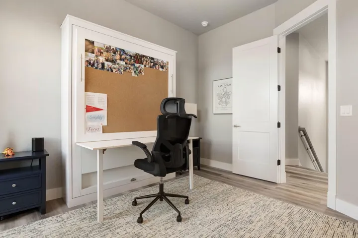Hosting overnight guests, this versatile bedroom with a Murphy bed effortlessly adapts to your lifestyle with comfort and style.