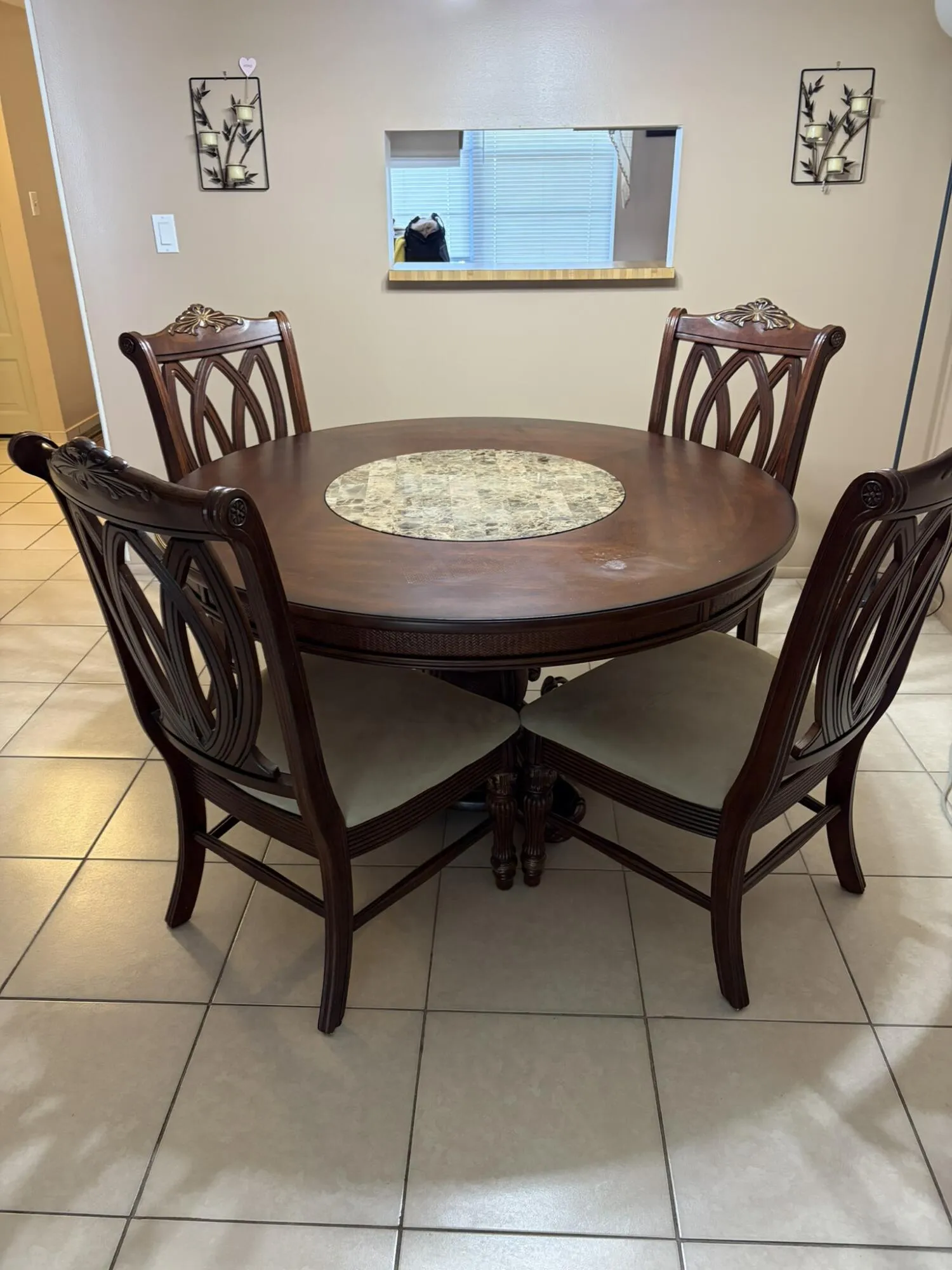 Dining area to kitchen pass-thru opening. Furniture included.