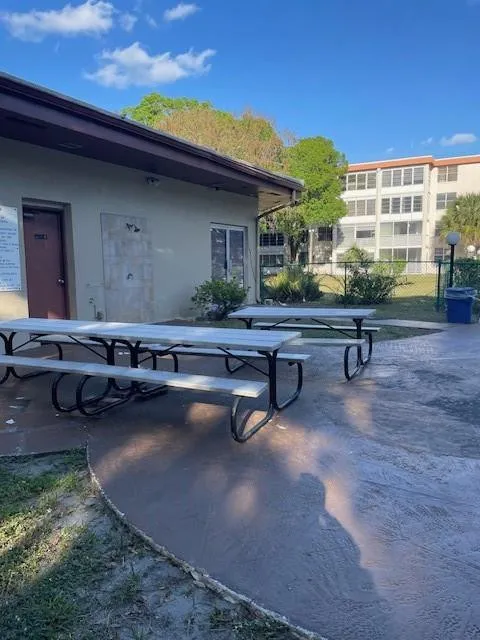 Picnic area next to clubhouse and pool.