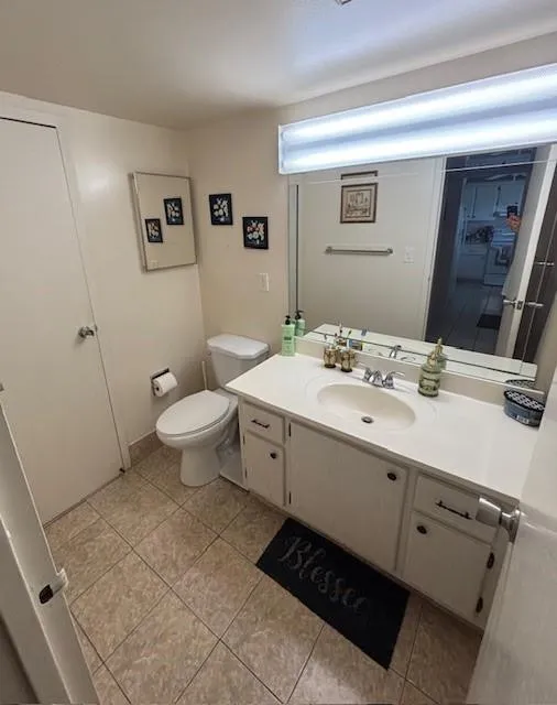 Bathroom connected to Master bedroom to hall way.