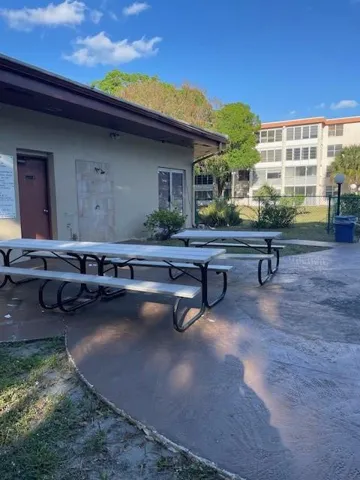 Picnic area next to clubhouse and pool.