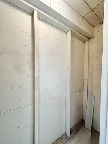 STORAGE CLOSET ON PORCH