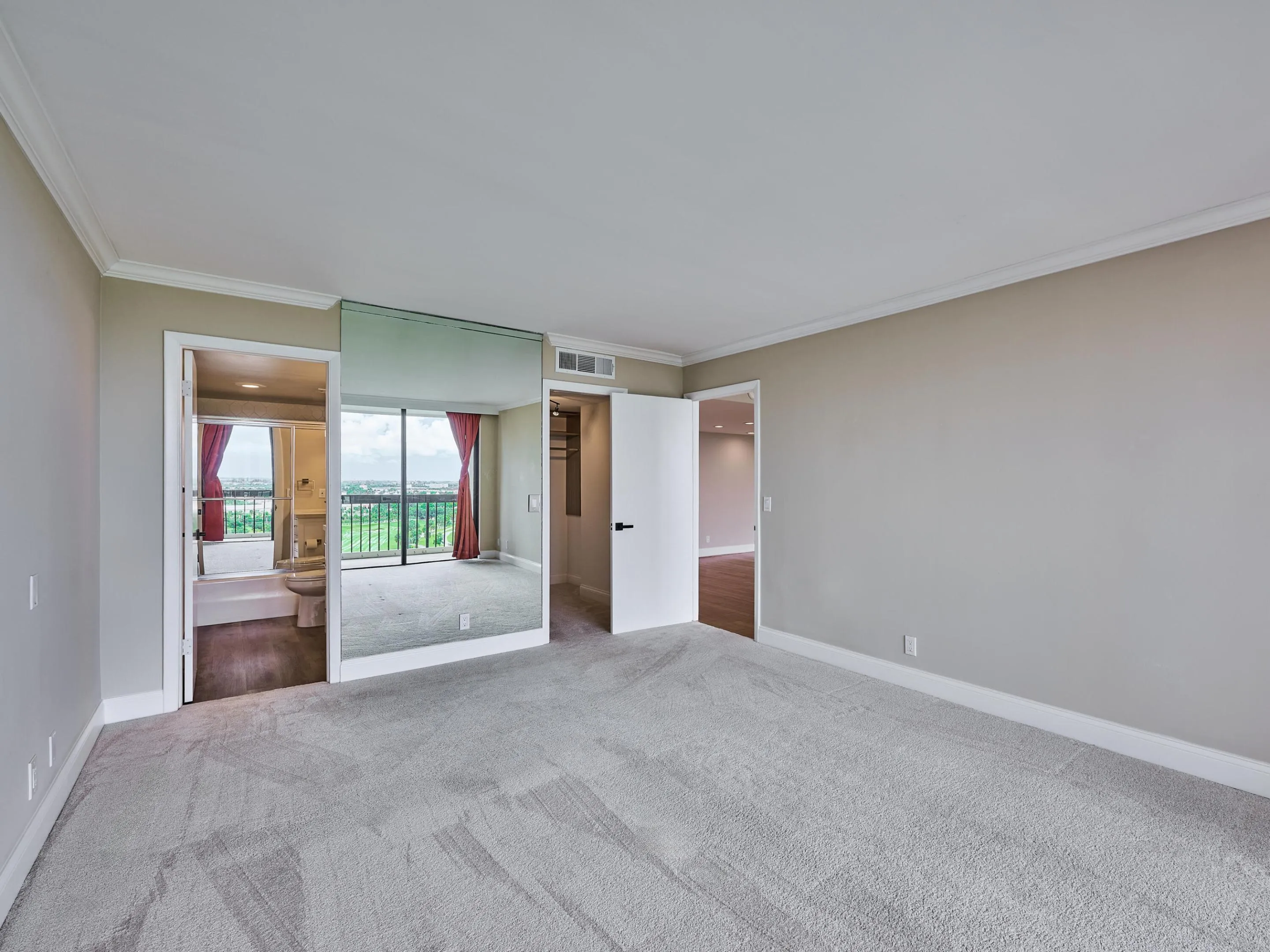 Carpeted bedroom for comfort.