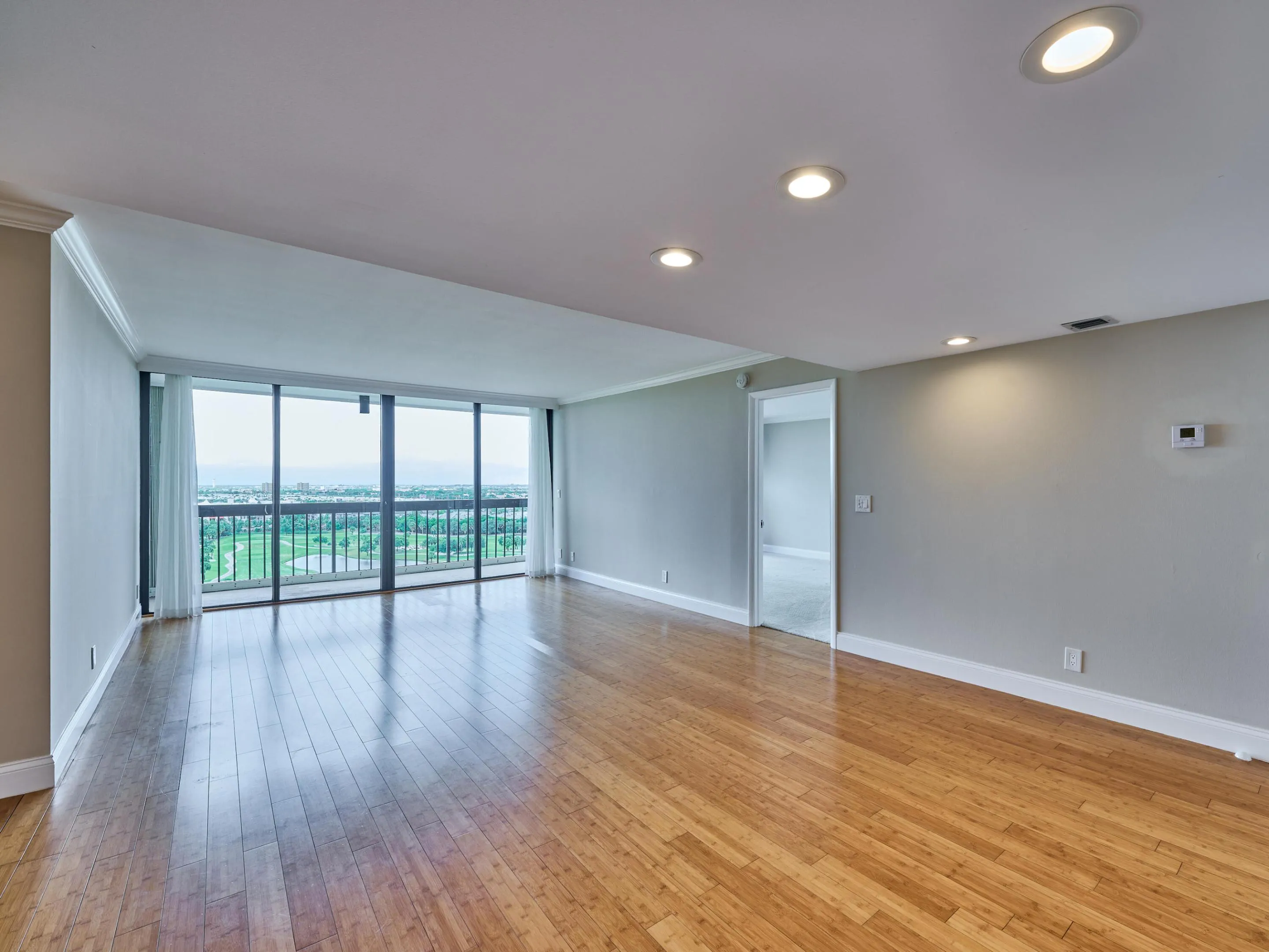 The dining room wall offers a place for a buffet, console, or desk.