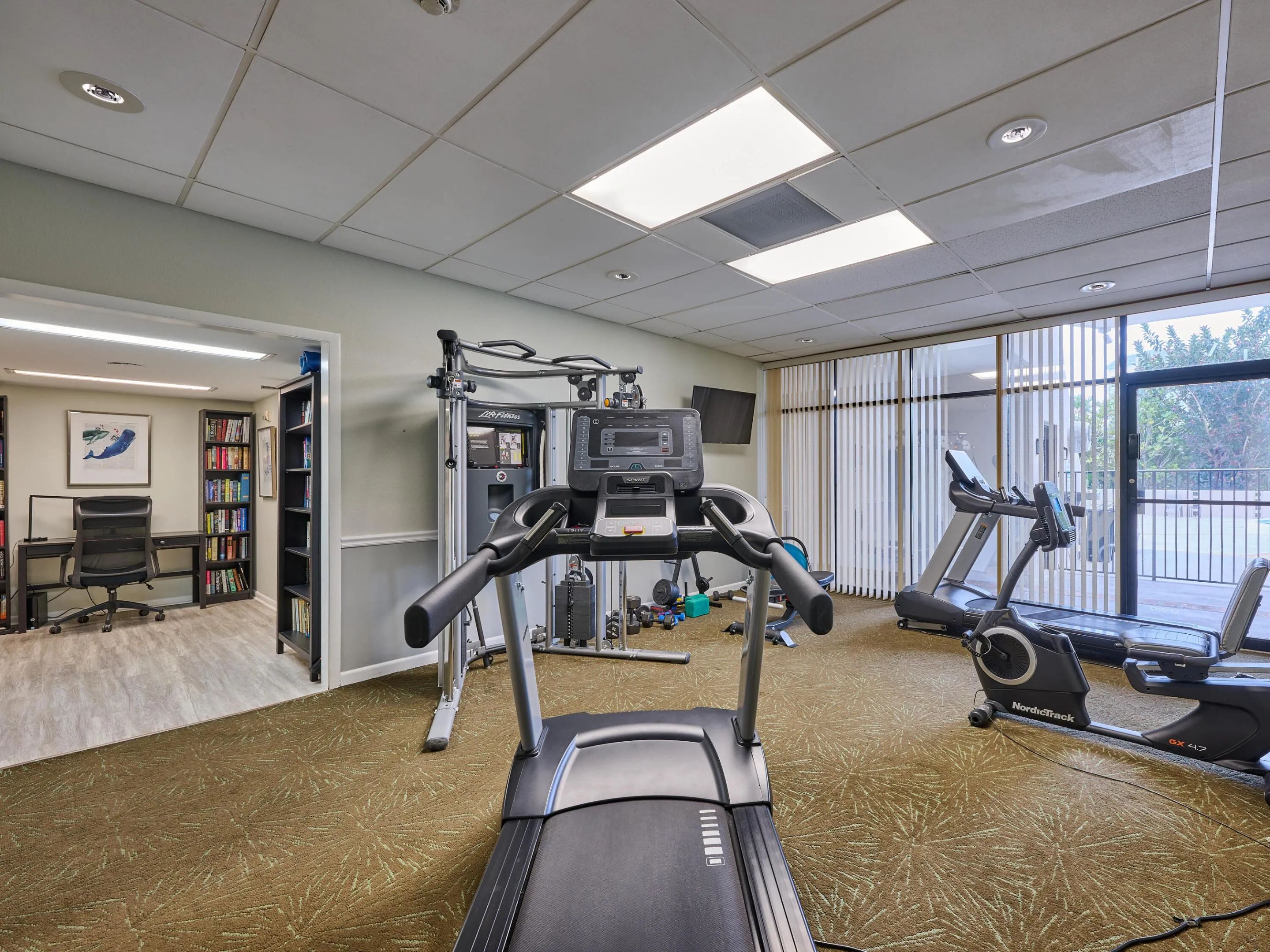 Gym with adjoining library.