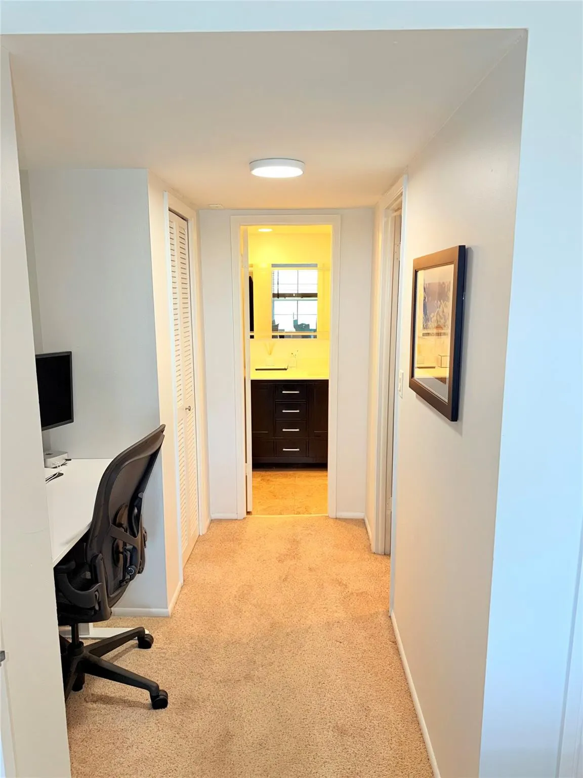 Hallway to Bathroom with office nook