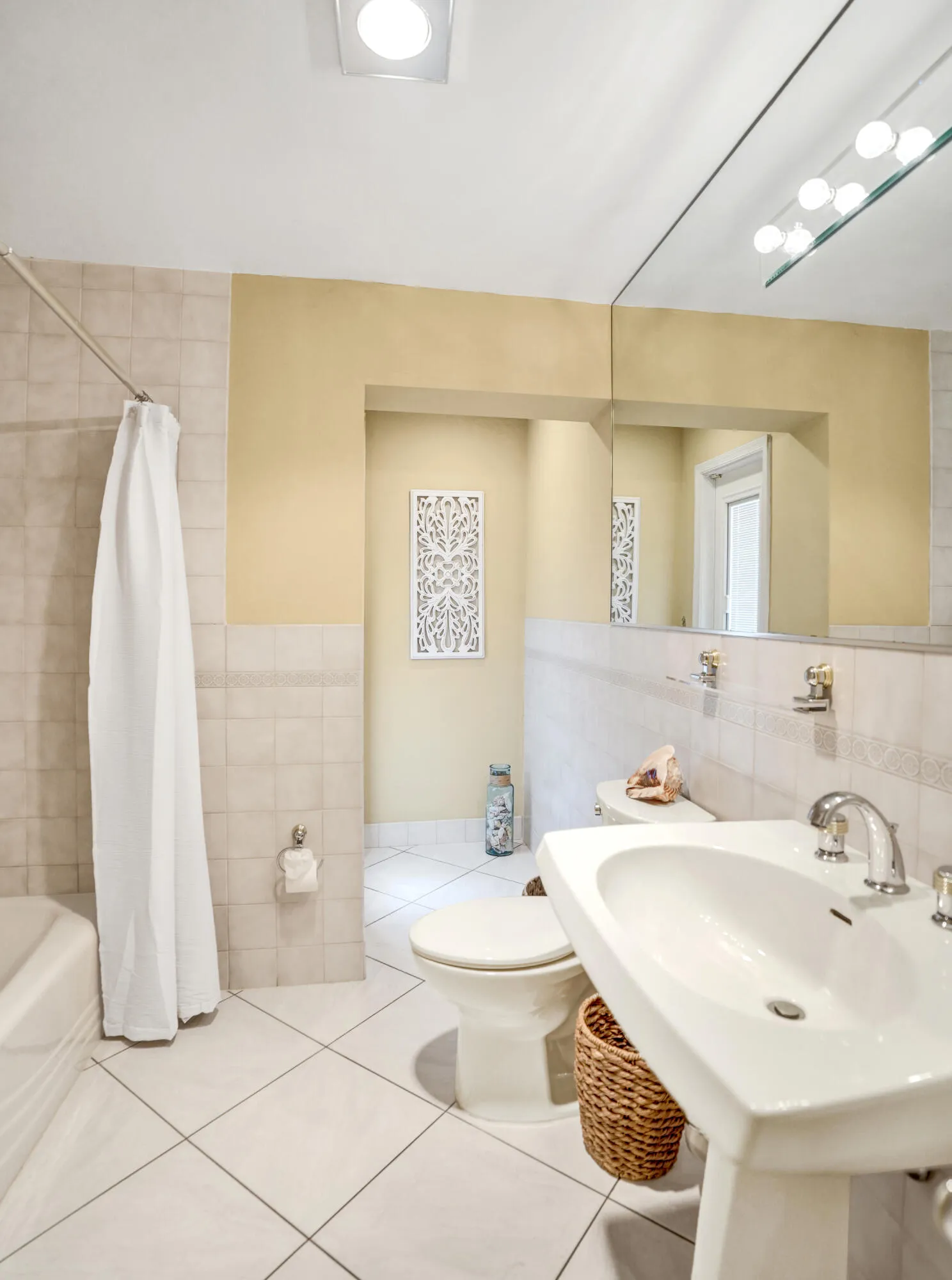 Large guest bath also serves as cabana bath