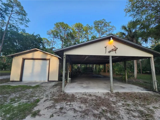 Detached One car garage and carport