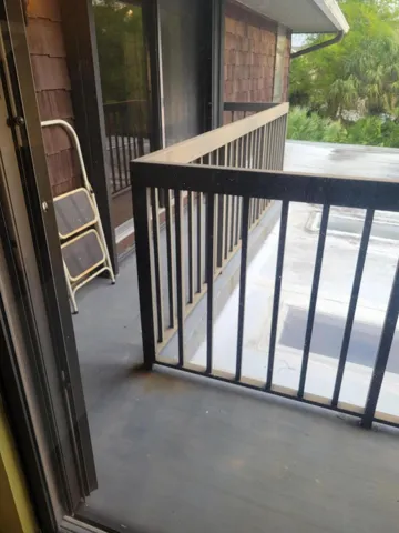 There is a large wrap around balcony outside of Master and second bedroom.