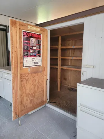 Lots of shelves line this over sized about 80 square feet of space. Get as organized as you want.