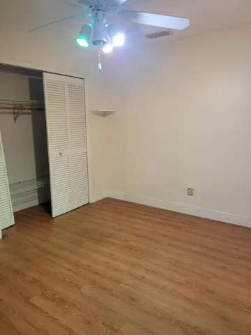 This bedroom is 13 x 10.6 very roomy and has a large closet. If you add another pole you can double your space.