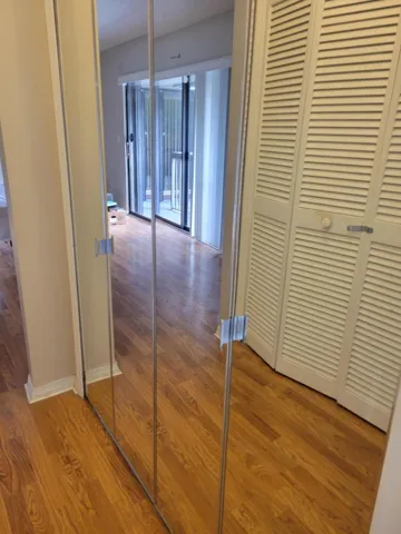 Doors are closed showing mirrors to check yourself in before you head out for the day.