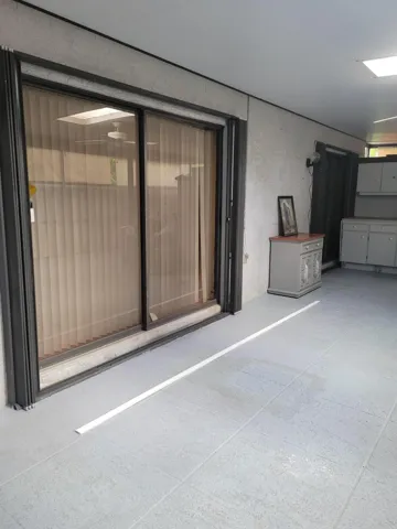 Note large slider that opens from Living room to huge screened in porch to allow cool air to flow through.