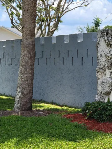 This is the castle effect/fence that greets you as you head toward the entrance of Camelot Gardens.