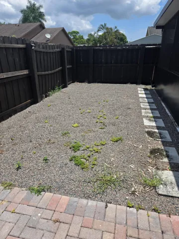 Side Yard at end of the pavered Driveway