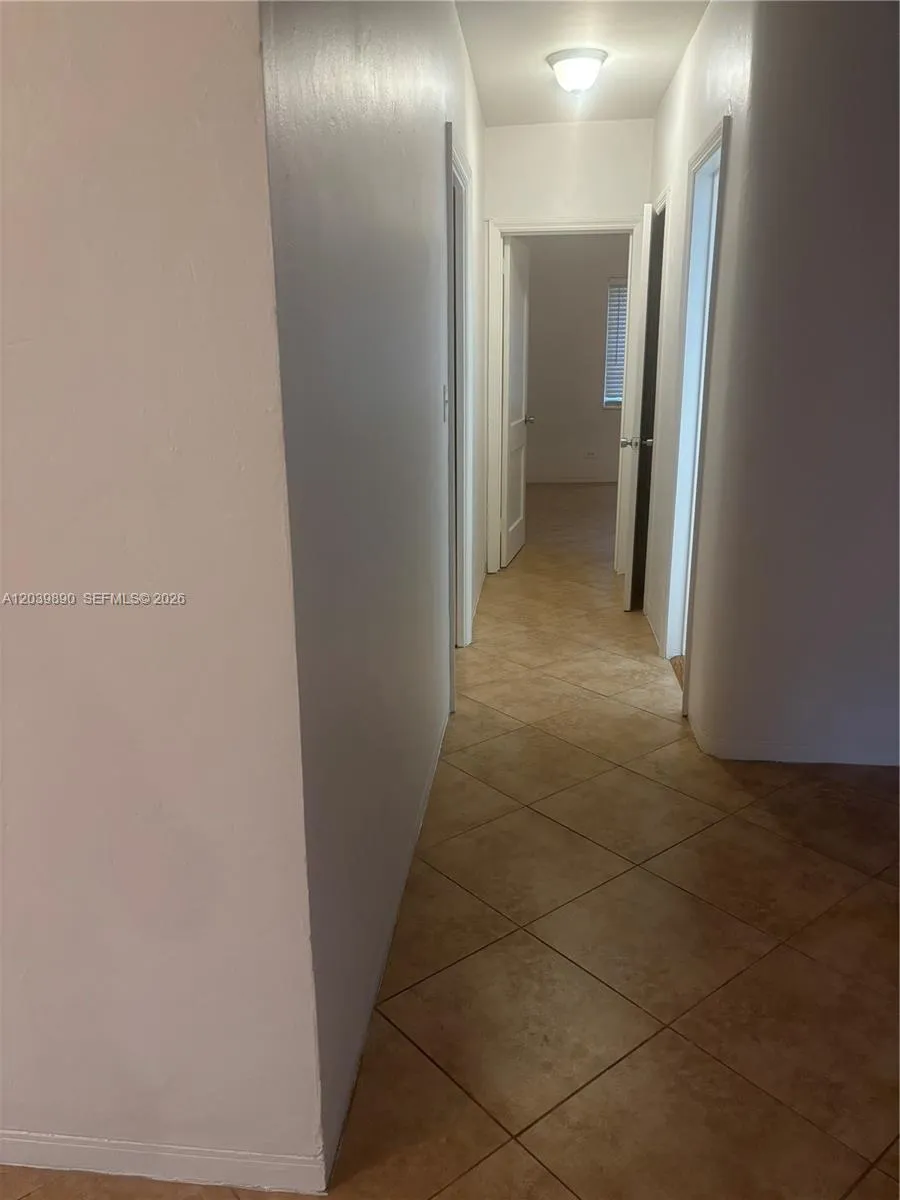 Hallway to Bathroom and bedroom.