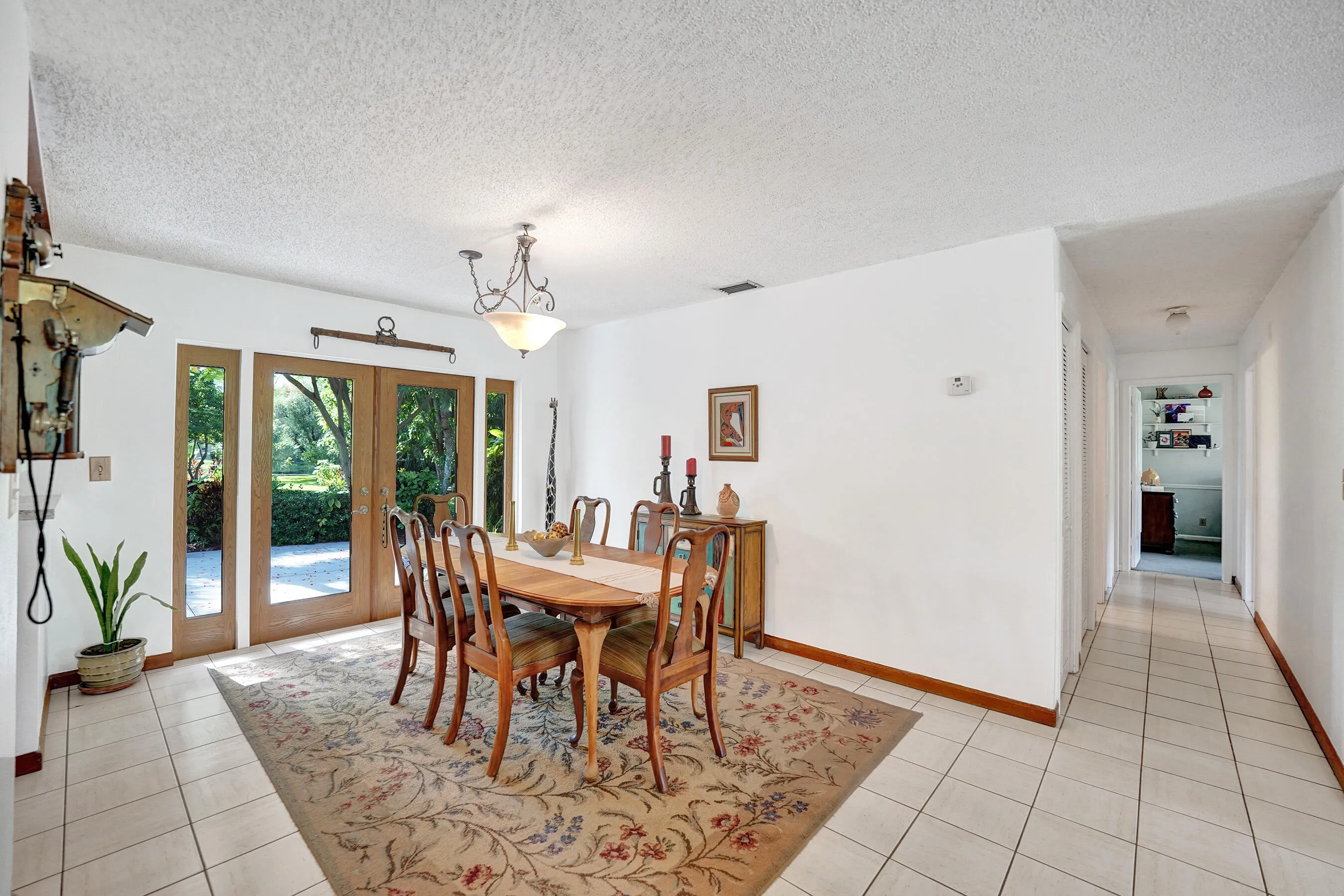 French Doors Open to Expansive Patio