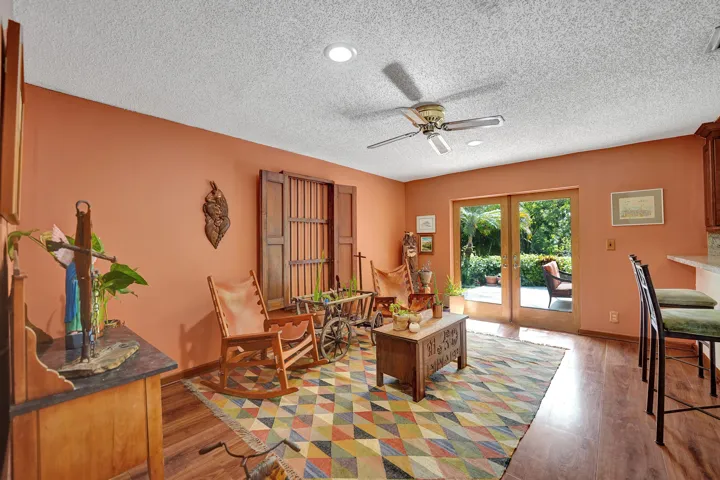 Versatile flex space with patio access.