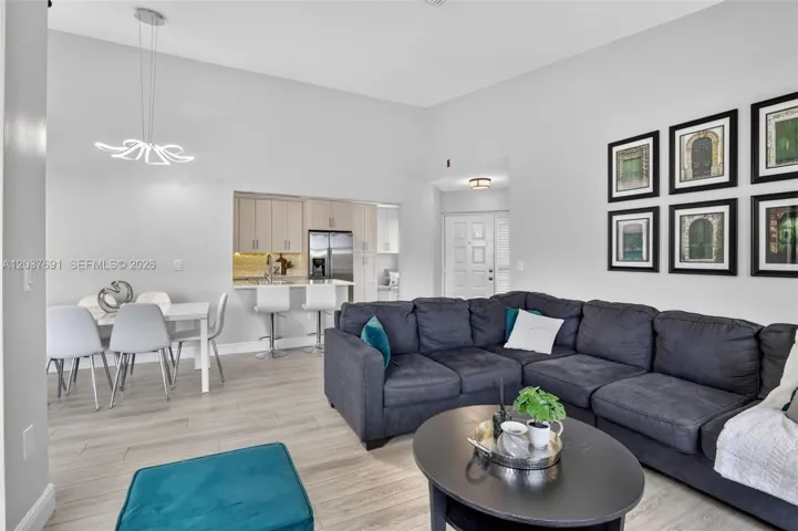 From morning coffee to gatherings with family and friends, this light-filled living space offers the perfect blend of comfort, style and functionality