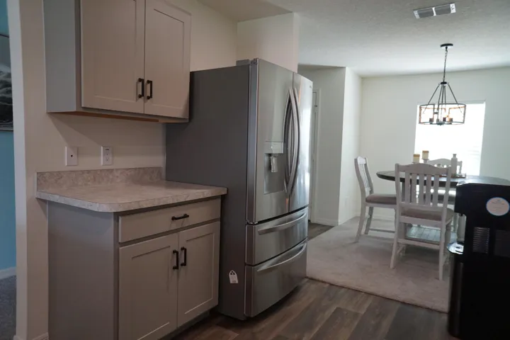 Modern kitchen cabinetry with matte black hardware