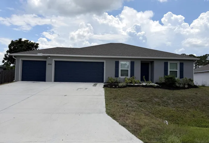 3 car garage with 3 car wide driveway