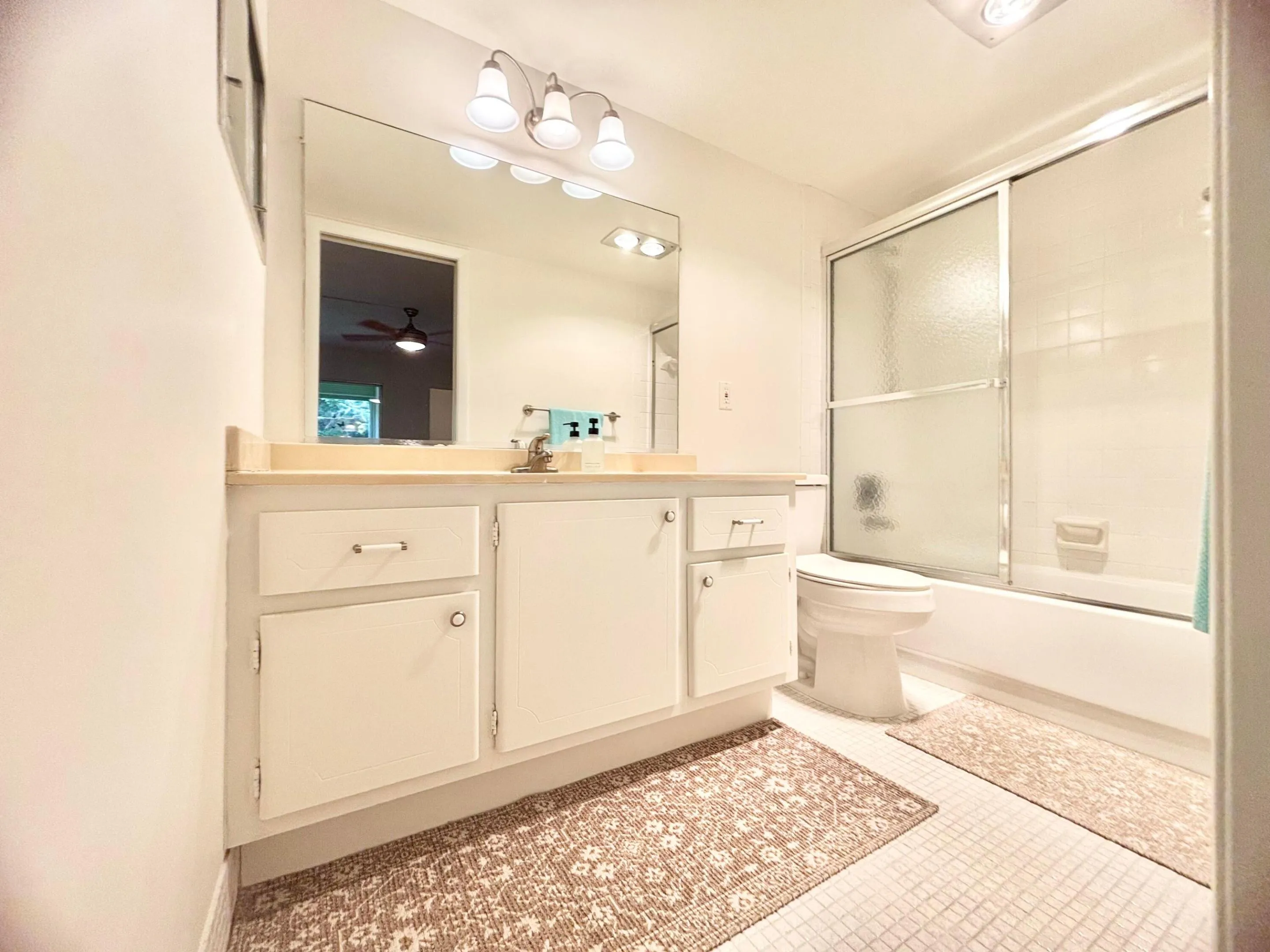 En-Suite Primary Bathroom with Tub & Glass Shower Doors