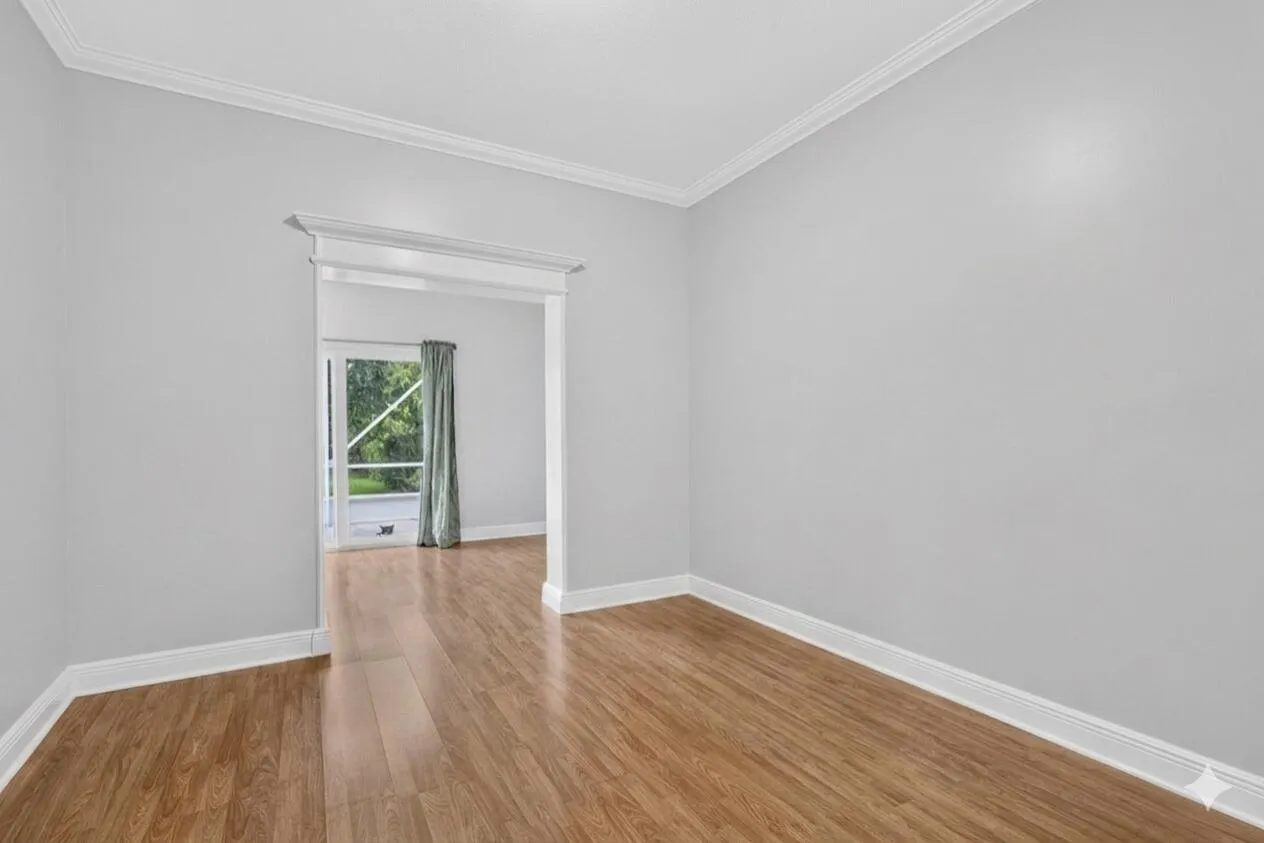 First floor bedroom with seating area.