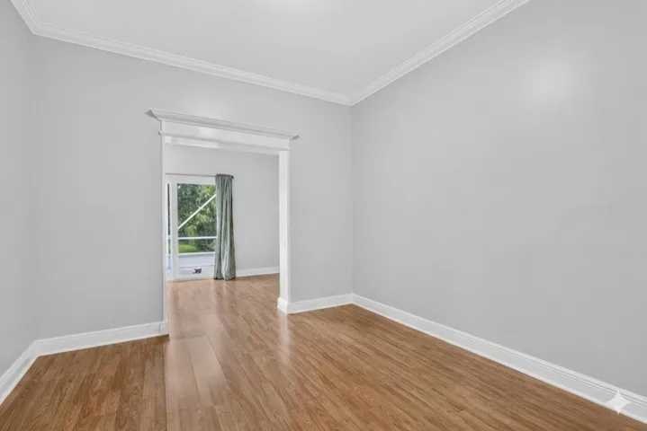 First floor bedroom with seating area.