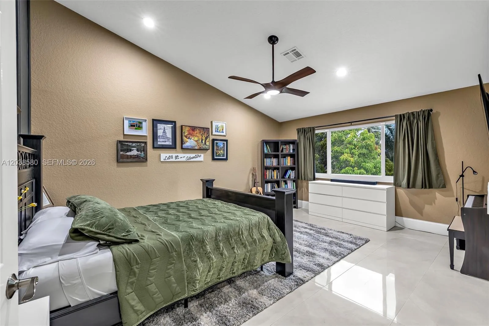 SPACIOUS PRIMARY BEDROOM WITH VIEW OF POOL AND WATER