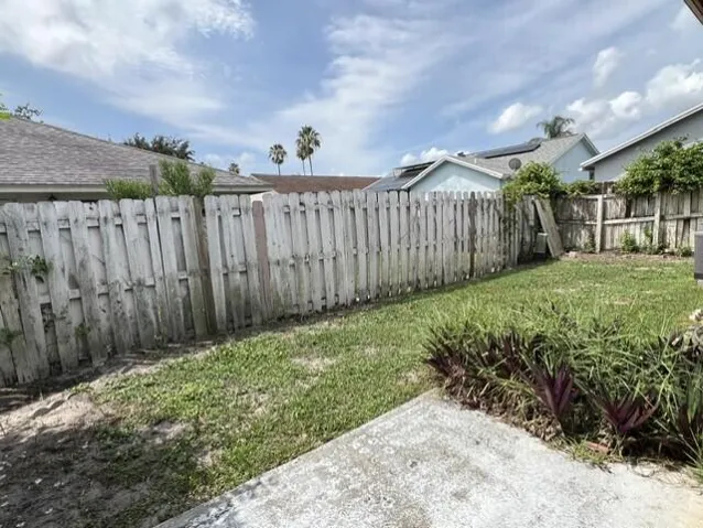13-Fenced back yard