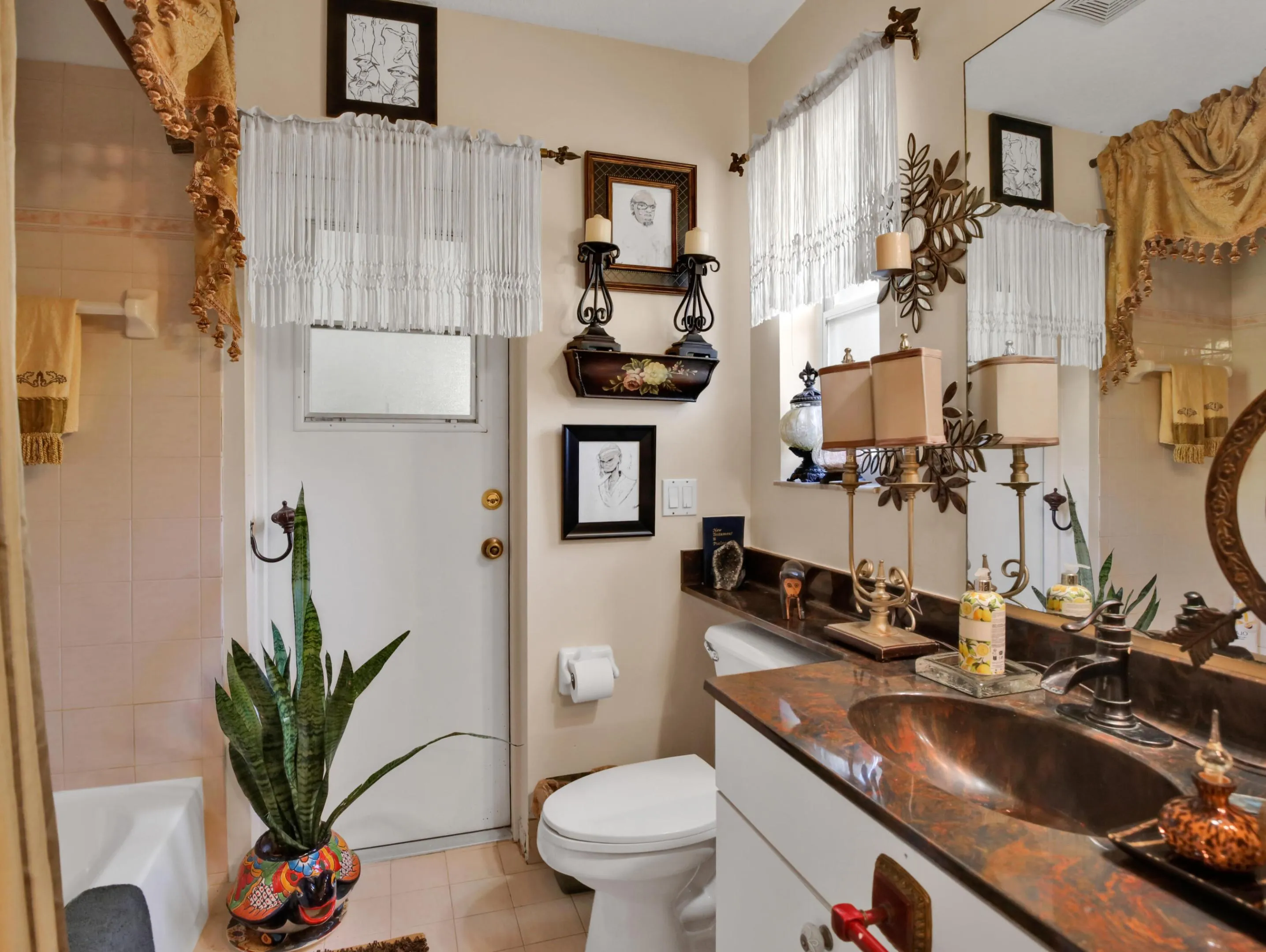 The 2nd bathroom is a cabana bathroom that has an exit door to the patio. Drop in a swimming pool and you already have a bathroom to the outside.