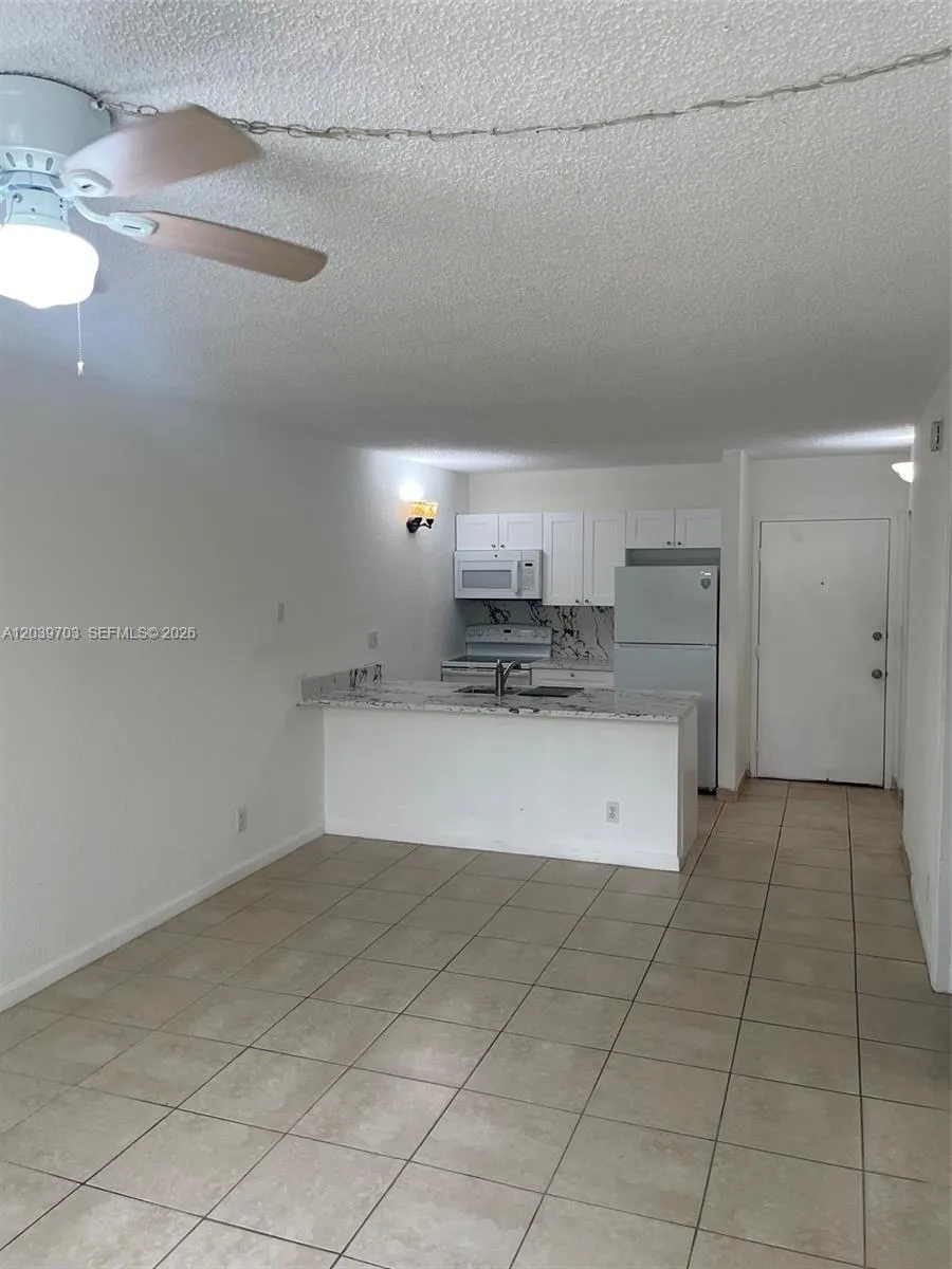 Kitchen, family room and the unit Main door.