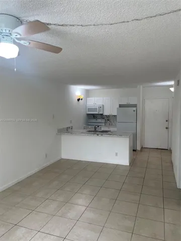 Kitchen, family room and the unit Main door.