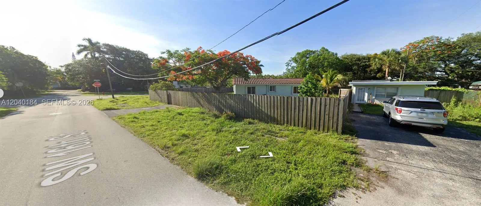 Cottage to the right where car is