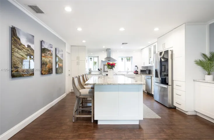 Very large oversized single slab centers the kitchen