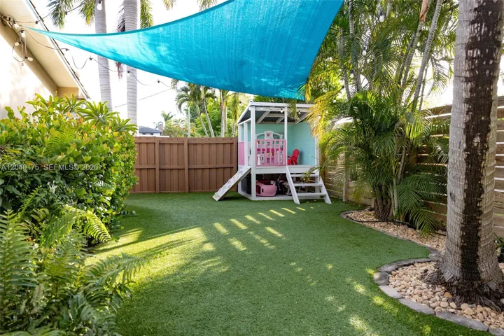 No grass, all turf - private area off pool