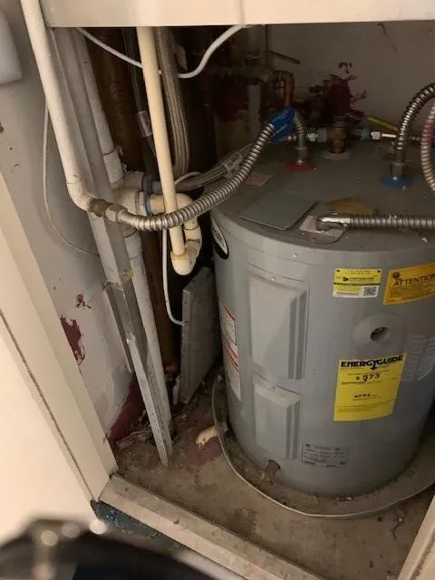 HOT WATER HEATER & A/C CLOSET