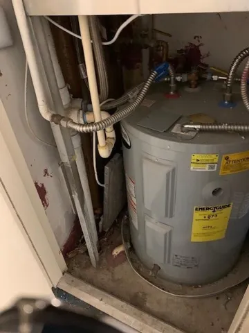 HOT WATER HEATER & A/C CLOSET
