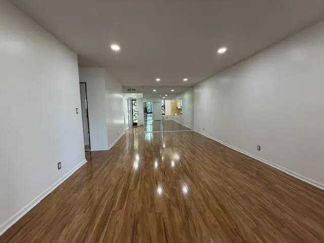 Serving window in dining area to kitchen.